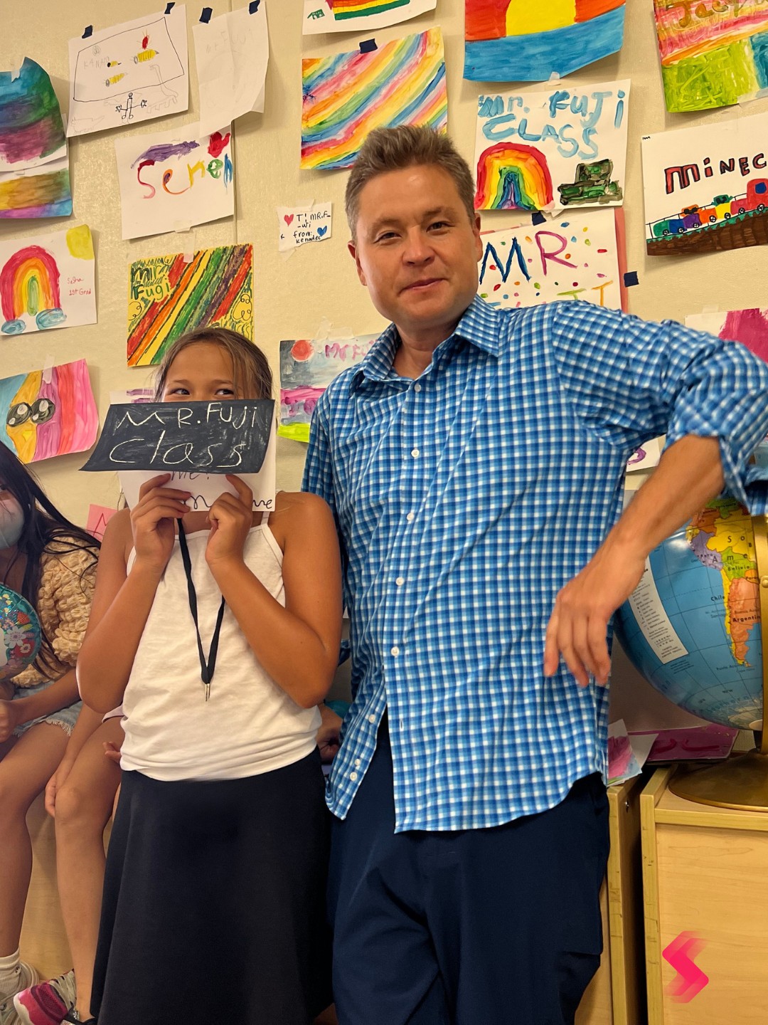 Students collaborating on digital learning devices